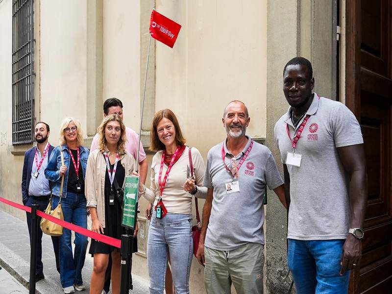 A group of tourists in line at the Misericordia Museum with their guide from The Tour Guy.