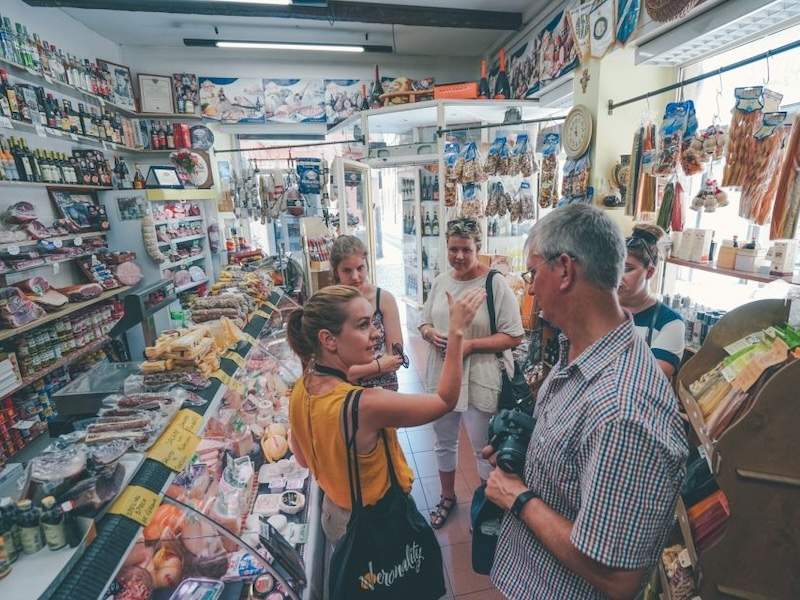 People in a traditional bottega