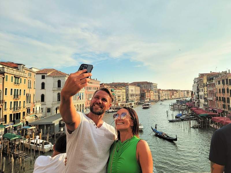 couple in front of gondola