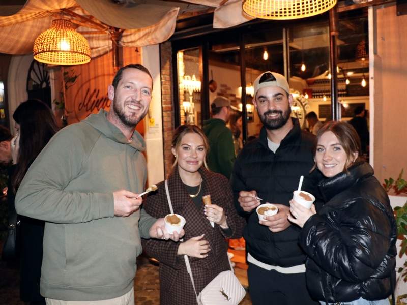 A group of tourists eating gelato while on a tour with The Tour Guy.