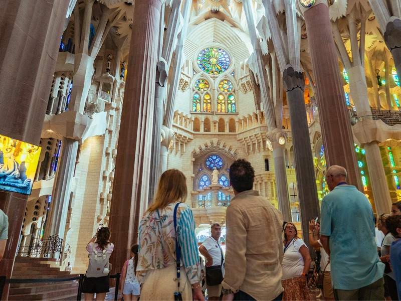 Girl looking at Sagrada Familia