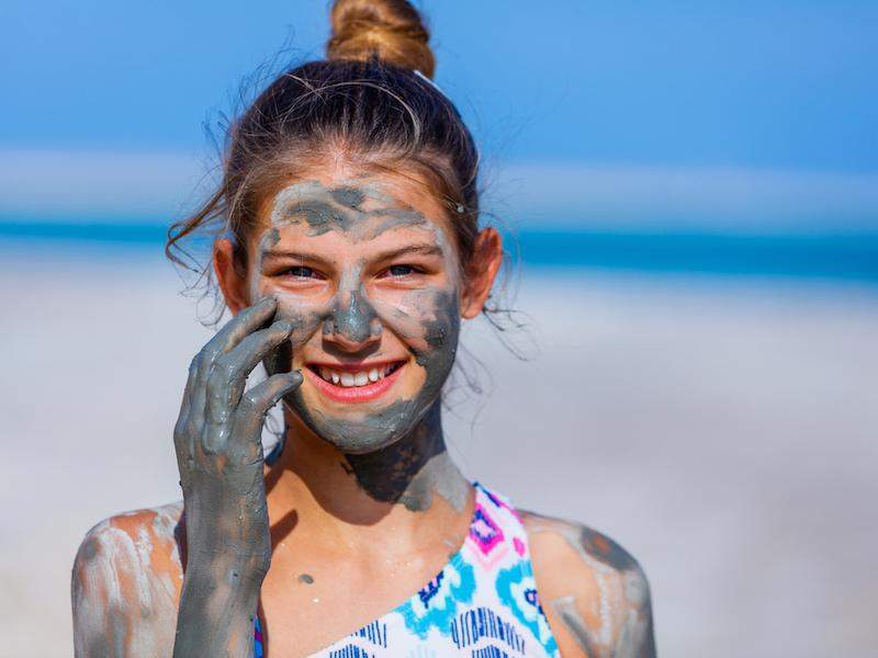 girl with mud on face