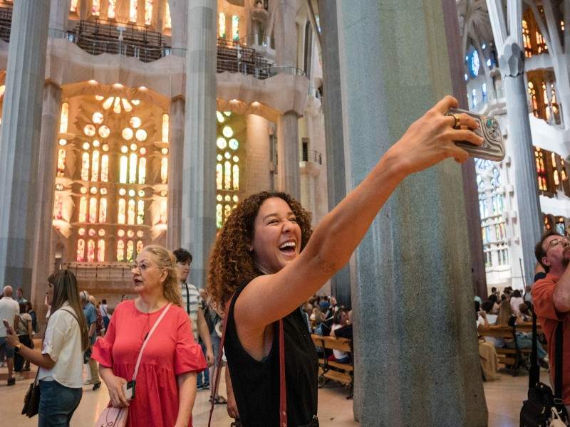 Girl looking at Sagrada Familia