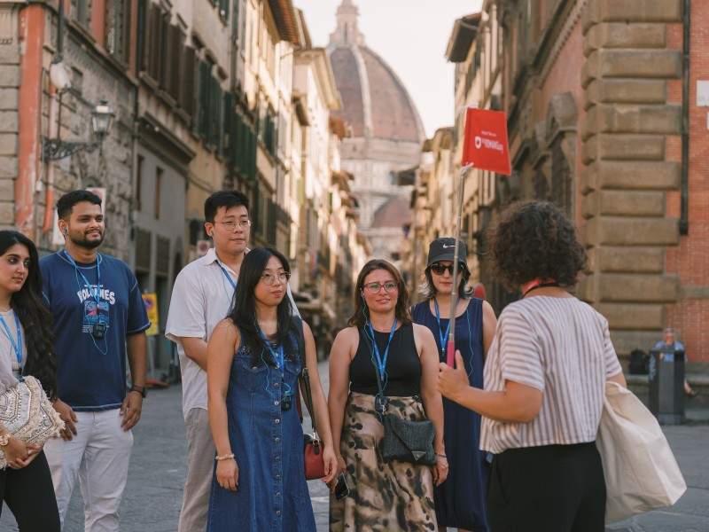 A group of tourists outside of the Misericordia Museum with their guide from The Tour Guy.