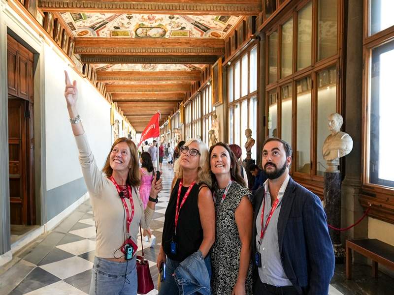 A group of toursts inside the Uffizi Gallery while on tour with The Tour Guy.