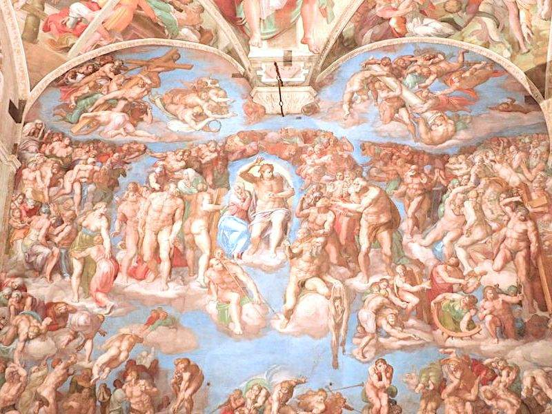 An image of The Last Judgement inside the Sistine Chapel.