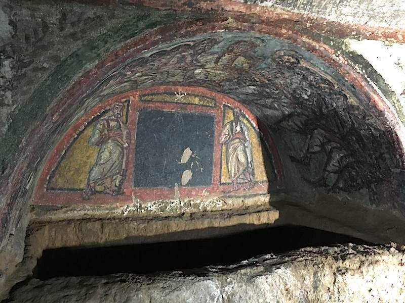 An image of a fresco on the walls of the Roman Catacombs.
