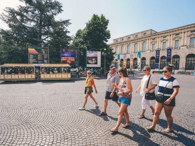 People walking in Piazza delle Erbe