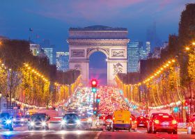 Arc de Triumph in Paris at night.