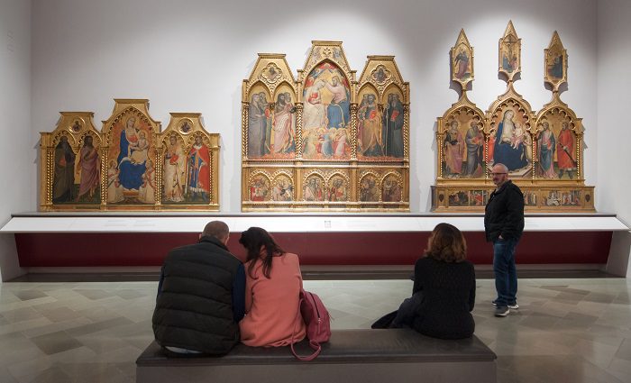 people sitting in front of Gothis Art in Accademia Gallery Florence.