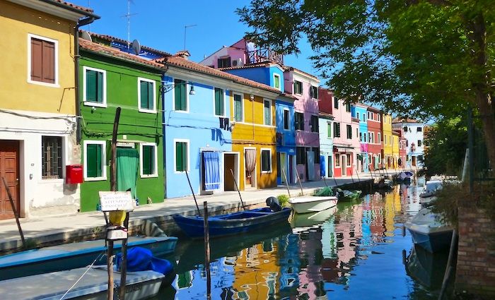 the colourful buildings of Burano which you can visit one of our best boat tours in Venice.