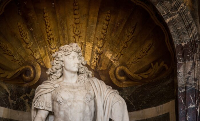 Louis SIV statue, the Sun King and man behind the Palace of Versailles
