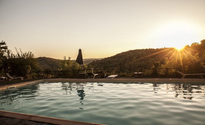 pool at sunset at borgo casa al vento tuscany