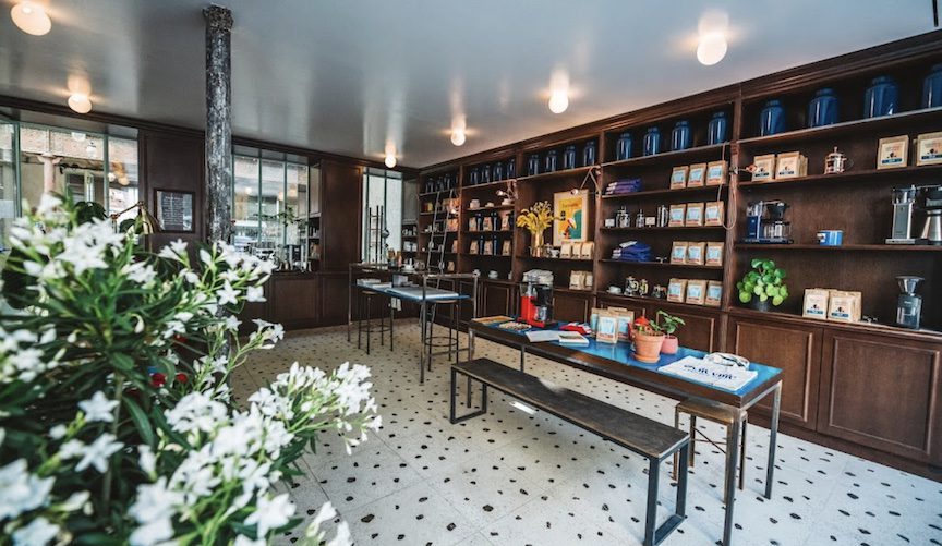 bookshelves lined with coffee bags.