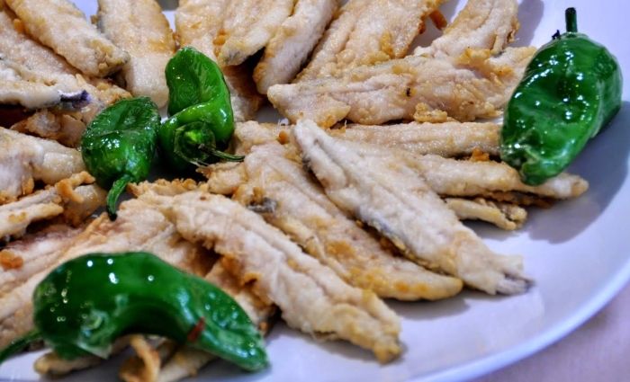 Plate of fried anchovies and green peppers at restaurant near the Alhambra