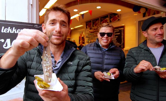 Sean, Angel and Brandon enjoying herring on one of our best tours of Amsterdam.