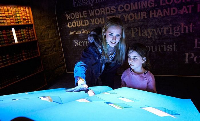 woman and girl interacting at epic irish museum