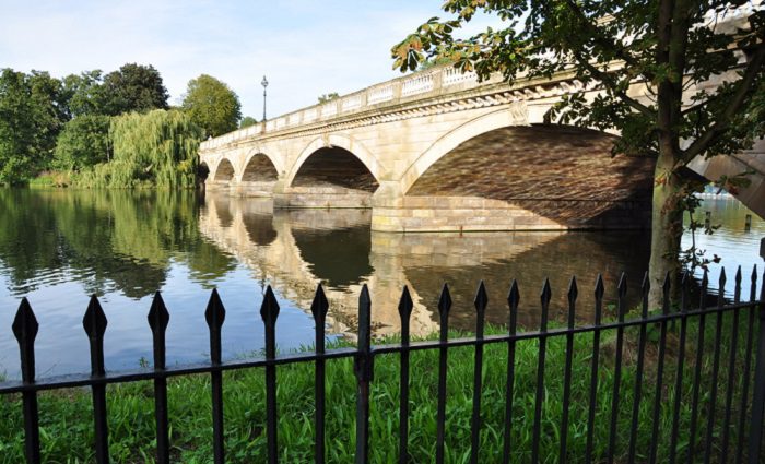 bridge with pond and fence in hyde park