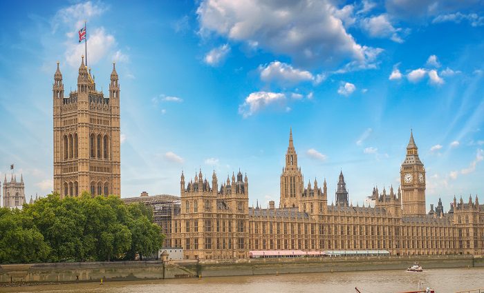 View of Palace of Westminster UK parliament from across the Thames river in London