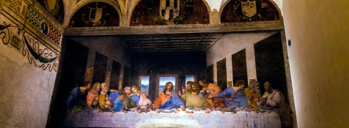 Painting of the last supper on a wall.
