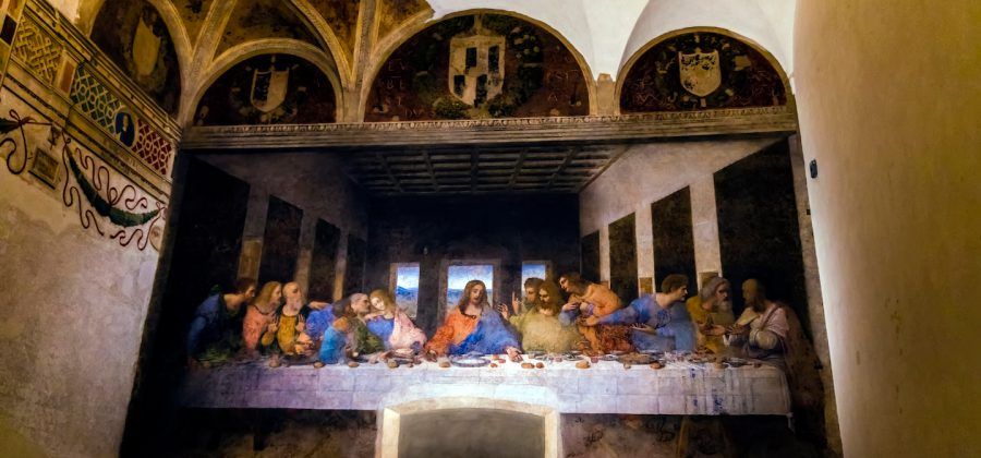 Painting of the last supper on a wall.