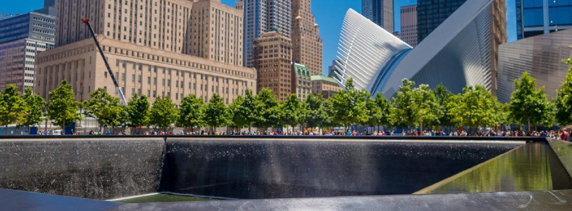 9/11 memorial in NYC during the day.