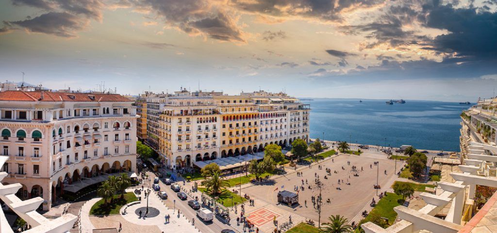 Aerial view of square in Thessaloniki with ocean.