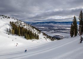 People skiing down a mountain in Jackson Hole