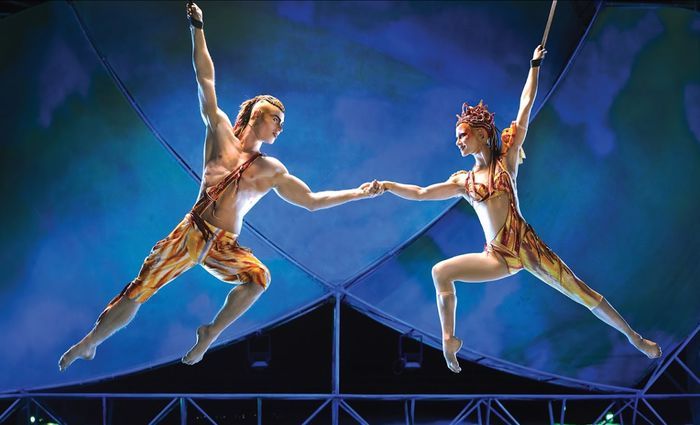 Two dancer holding hands for the Cirque du Soleil.