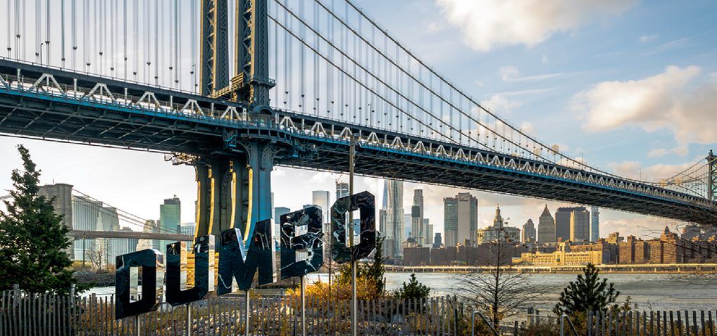 Dumbo sign with Manhattan Bridge.