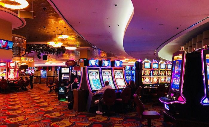 brightly lit interior of Foxwoods Resort Casino with slot machines