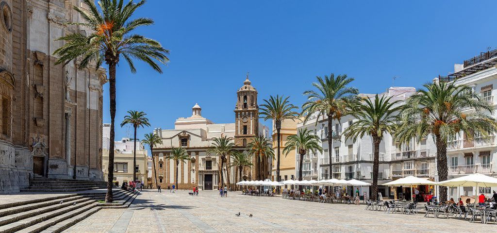 Courtyard with palm trees in Andalusia.