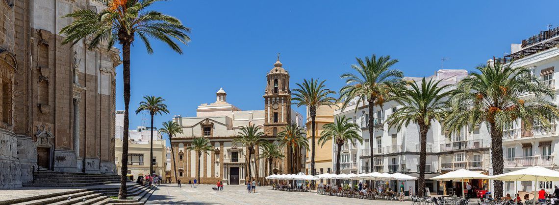 Courtyard with palm trees in Andalusia.