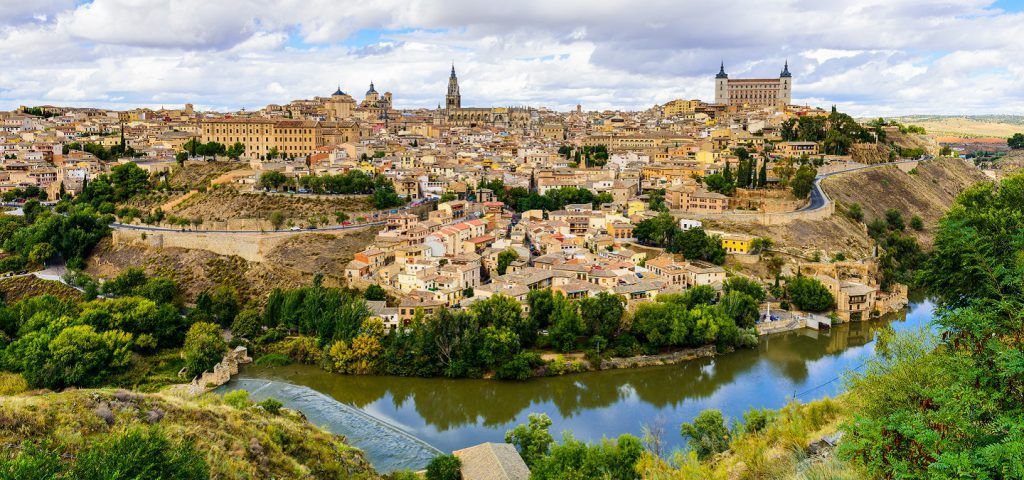 Skyline of the Toledo Spain with river in the foreground.