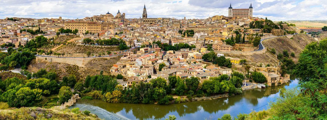 Skyline of the Toledo Spain with river in the foreground.