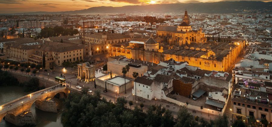 Aerial view of the city of Cordoba with the sunset in the background.