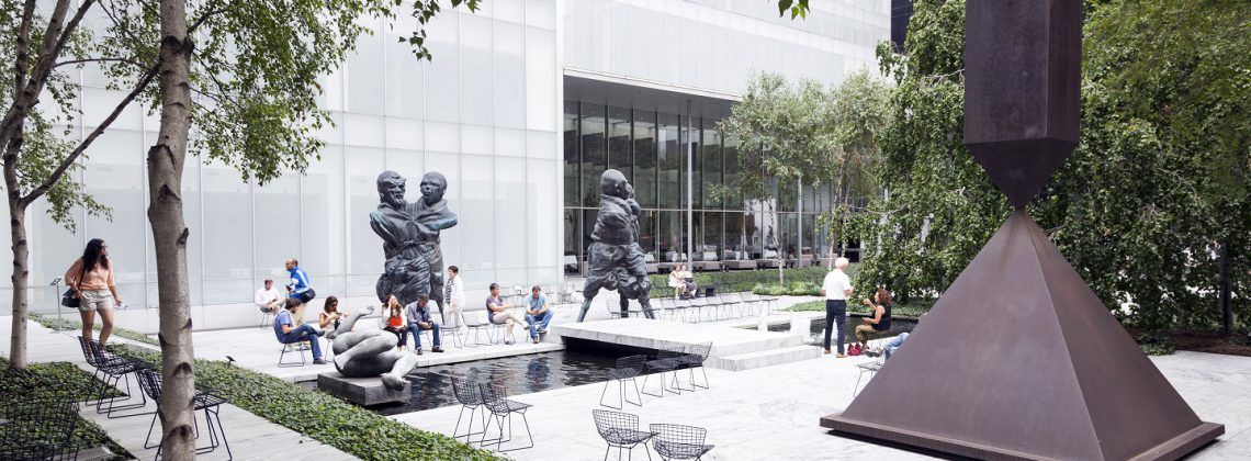 Interior of the Abby Aldrich Rockefeller Sculpture Garden with people.