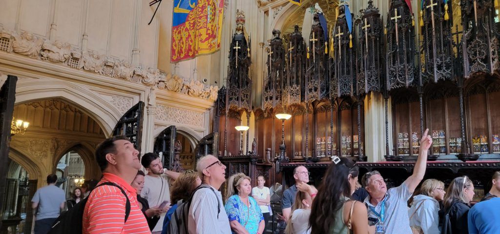 People looking at the ceiling of Westminster Abbey.