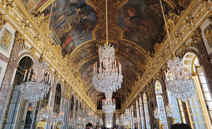 Interior of the Palace of Versailles hall of Mirrors.
