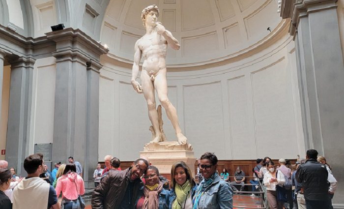 Family in front of david at accademia