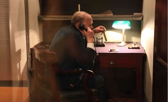 Exhibit showing Winston Churchill on the phone in the Churchill War Rooms in London.