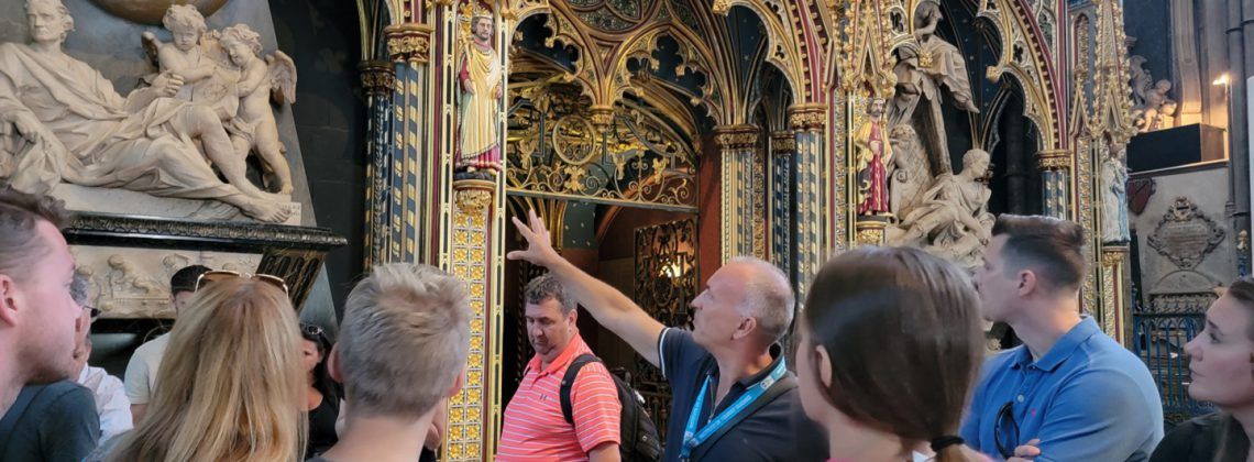 group looking at tombs in westminster abbey