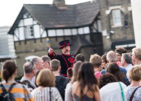 beefeater talking with crowd