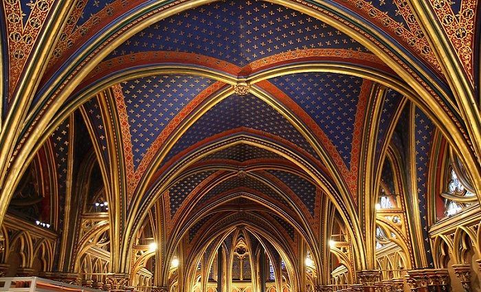 Interior view of Sainte-Chapelle in Paris and the stunning gold ceiling.