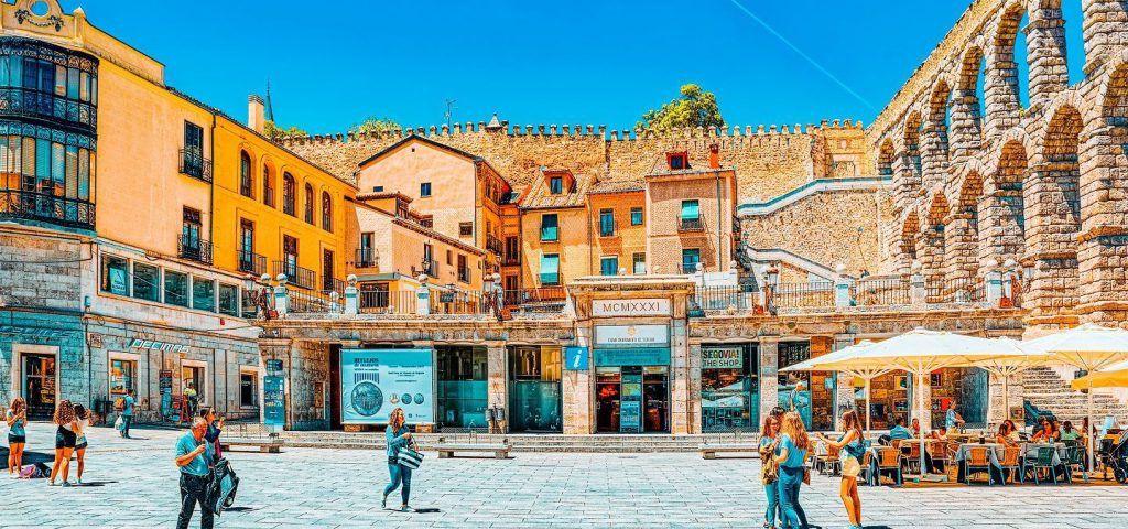 People on the streets of Segovia.