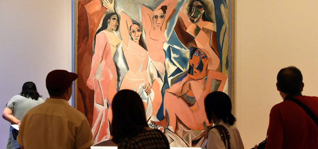 Les Demoiselles painting with people looking
