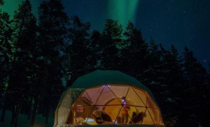 glamping dome with northern lights