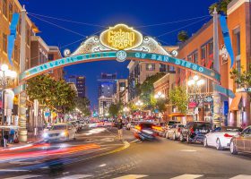 Vibrant colors of the San Diego's Historic Gaslamp Quarter sign hanging above the street