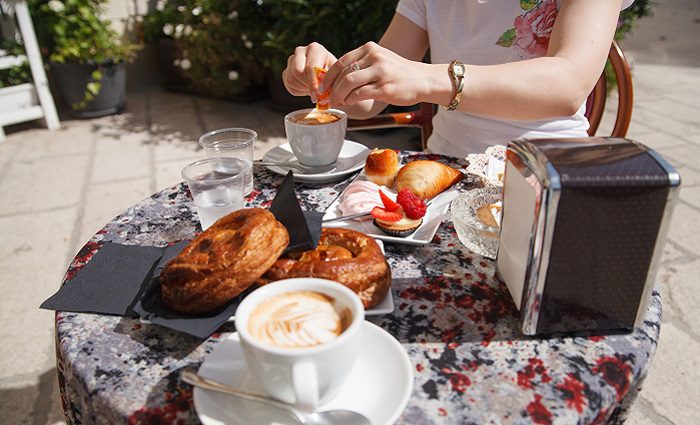 pastries and espresso on cafe table