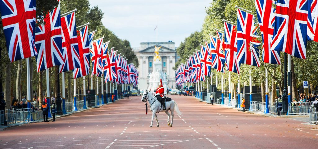 horse guard on Mall with british flags